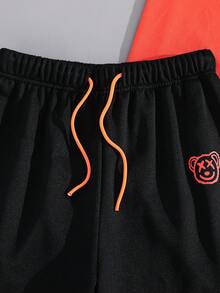 SHEIN 2件套青少年男童休闲可爱卡通熊印花短袖T恤和黑色短裤套装，舒适百搭，适合日常穿着、上学、郊游、户外活动、音乐节、假期、海滩度假、夏季、春夏穿着。 - 橘色 - 查看 8