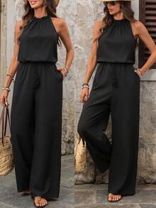 EMERY ROSE Bộ áo liền quần nữ màu trơn, thắt eo, có túi, ống rộng, kiểu dáng thường ngày, thích hợp cho kỳ nghỉ hè, du lịch, nghỉ mát. Áo liền quần đen cho nữ, áo liền quần cổ yếm cho nữ, áo liền quần không tay, áo liền quần thường ngày cho nữ, áo liền quần nữ để mặc đi chơi, trang phục mùa hè, trang phục đi biển cho nữ, trang phục thường ngày cho nữ. - màu đen - Xem 4