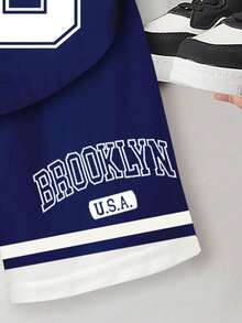 一套男童休闲运动套装，布鲁克林23号蓝白撞色条纹印花圆领短袖T恤搭配蓝色短裤，夏季套装，适合休闲穿着和运动。 - 彩色 - 查看 5