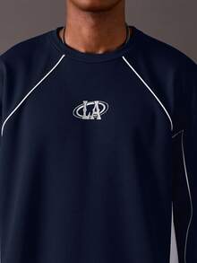 STYNVO Bộ đồ thể thao nam gồm áo nỉ dài tay cổ tròn in chữ phối màu tương phản và quần nỉ có túi xéo. - Màu xanh hải quân - Xem 6