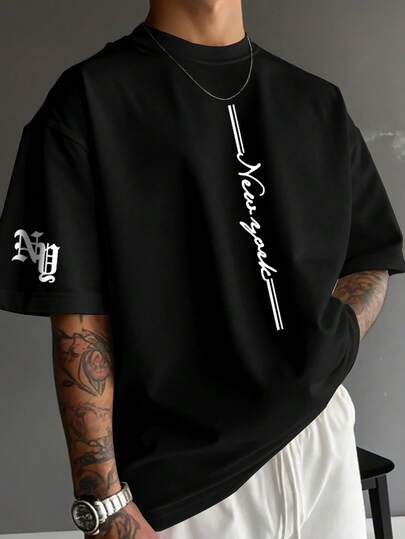 Manfinity EMRG Camiseta casual de manga corta con cuello redondo y estampado de letras, de corte holgado y versátil para hombres