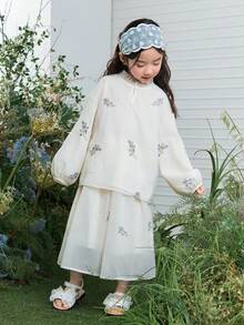 DAZY Set de 2 piezas con blusa de manga larga de unicolor y minifalda con bordado floral, estilo coreano para niñas jóvenes - Albaricoque - Ver 3