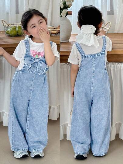 SHEIN Young Girls' Three-Dimensional Bow Blue Denim Loose Jumpsuit, Kid Girls Spring And Summer Casual Vacation Country Boho Wear, Beach Outfits For Kid Girls,Western Street Wear For Girl,Spring Break Outfits,Rave Outfits Festival Denim Jumpsuit,Young Girl Vacay Outfits