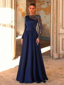 Aureia Đầm dài tay cổ tròn màu xanh hải quân thanh lịch, chất liệu satin đính sequin, phối nhiều mảnh vải, xếp ly phía trước, thắt lưng giả và chân váy chữ A rộng, phù hợp cho mọi dịp trang trọng, kín đáo nhưng vẫn mới lạ và sang trọng, thích hợp cho tiệc cưới, dạ hội cao cấp, dạ hội Trung Đông, tiệc tối trang trọng. - Màu xanh hải quân - Xem 6