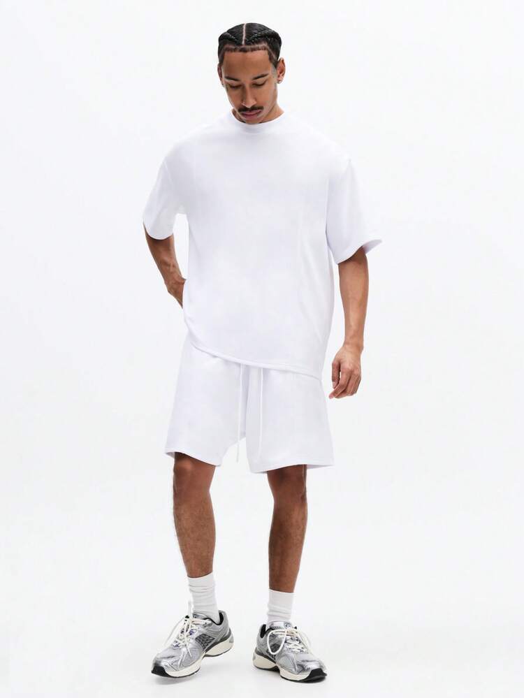 Completo t-shirt girocollo bianca e pantaloncini