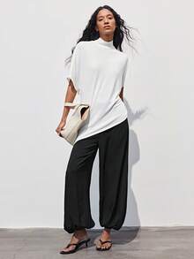 Maija 女士休闲通勤衬衫，纯色设计，立领，搭配宽松蝙蝠袖和不对称下摆，时尚舒适。适合日常通勤和休闲场合，展现女性自信和独特风格。 - 白色 - 查看 4