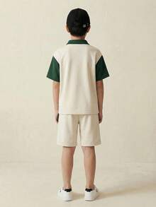 Casuvi Kids 2pcs/Set Casual Sports Contrast Color Stand Collar Loose T-Shirt & Shorts Set For Teenage Boys, Cream White Top With Green Sleeves & Collar, Boston Graphic, Cream White & Green Shorts With Boston Graphic Boys Summer Short Sets Boy Sport Wear 2 Piece Set Summer Boys 2 Pieces Set - Multicolor - View 2
