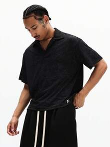 SUMWON Essentials Cropped Boxy Fit Ribbed Polo Shirt With Button Placket Collared Neckline Short Sleeve Casual Streetwear Top - Black - View 1