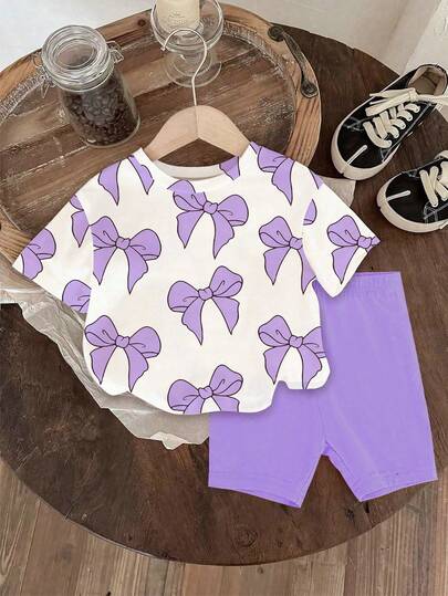 SHEIN 1 Set Baby Girls' Cute Bow Print Round Neck Short Sleeve T-Shirt And Purple Leggings Shorts Casual Outfit, Summer