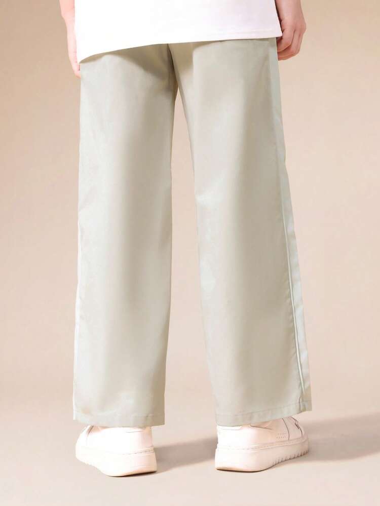 Pantalon de survêtement ample à jambes larges avec bande de propreté latérale