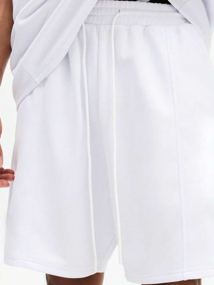 Completo t-shirt girocollo bianca e pantaloncini