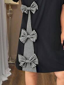 SHEIN Clasi 大码短袖A字迷你连衣裙，优雅休闲日常穿着，饰有蝴蝶结 - 黑色 - 查看 5