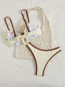 Swim DD+ 这款新款加大码（DD+）支撑提拉比基尼套装专为女性设计，采用奶油色双色纹理面料，搭配棕色撞色滚边和前蝴蝶结装饰，配有带衬垫的软杯文胸，提供最大程度的提拉效果和舒适感，高腰三角裤设计，完美贴合曲线身材，适合海滩、泳池派对、热带度假和度假村等场合。速干弹力面料，是追求时尚、支撑和自信的DD+罩杯女性的理想之选。 - 白色 - 查看 5