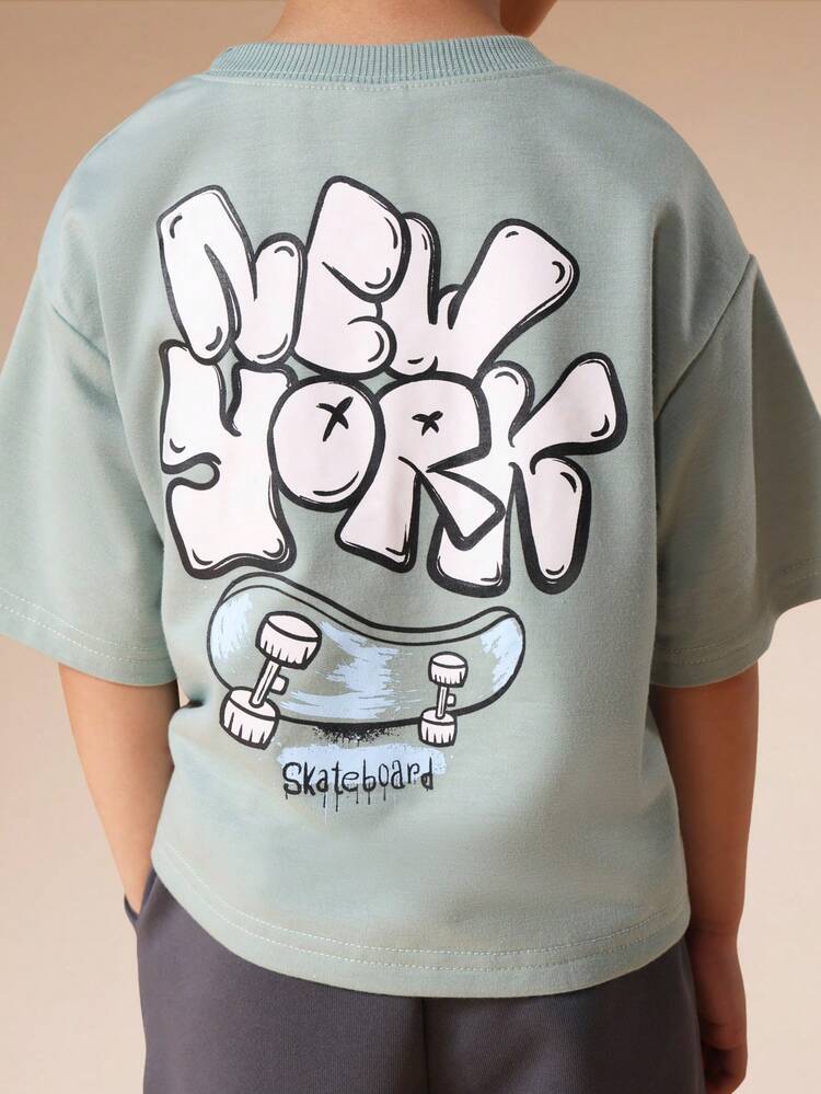 Short Sleeve Tee And Shorts Set With Skateboard Print