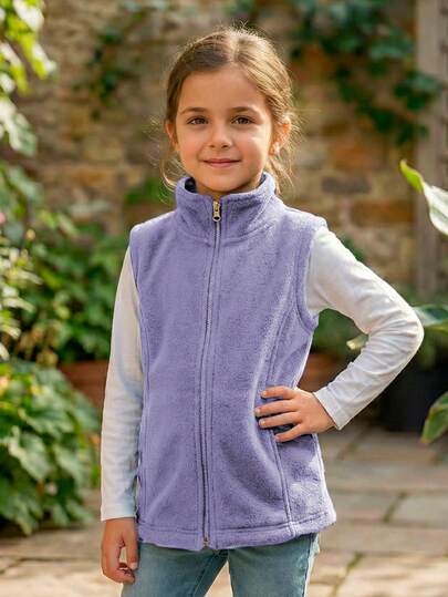 Chaleco afelpado tipo fleece con cierre completo y cuello alto. Abrigador, ligero y cómodo, ideal para niña
