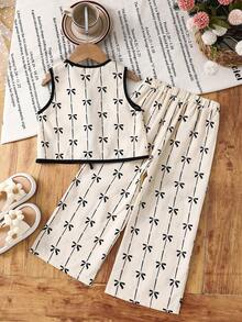 SHEIN 女童两件套蝴蝶结印花无袖上衣+A字裙套装，可爱优雅，适合返校季和春夏穿着