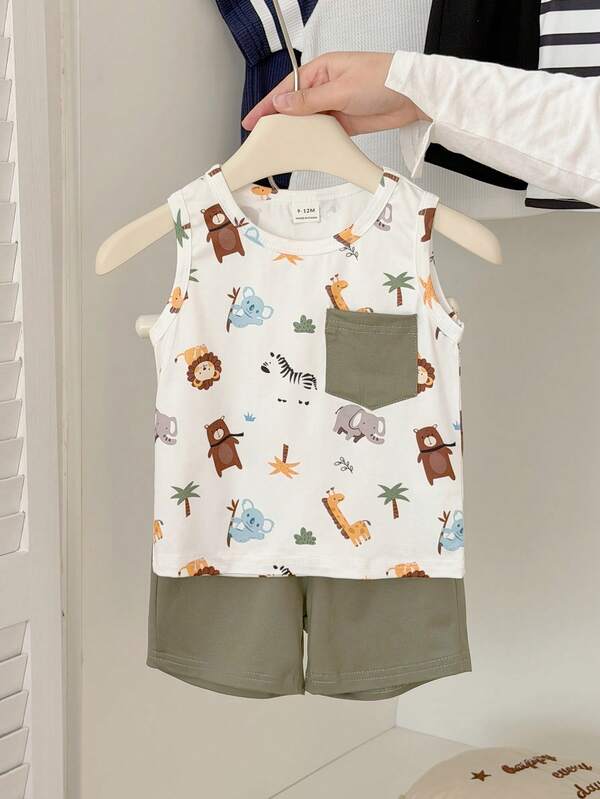 SHEIN Babyboy Summer Cartoon Animal Print Round-Neck Sleeveless Vest Paired With Pure Green Shorts Two Pieces Set, Pure White Base Color With Jungle Animal Full-Printed Patterns, Simple, Comfortable, Lively And Cute Style, Knitted Fabric, Fit Well, Green Patch Bag On The Side Adds Practical Details, Perfect For Visiting Wildlife Parks, Participating In Parent-Child Nature Study Tours, Outdoor Adventures, Comfortable At Home, And Happy Party Time.
