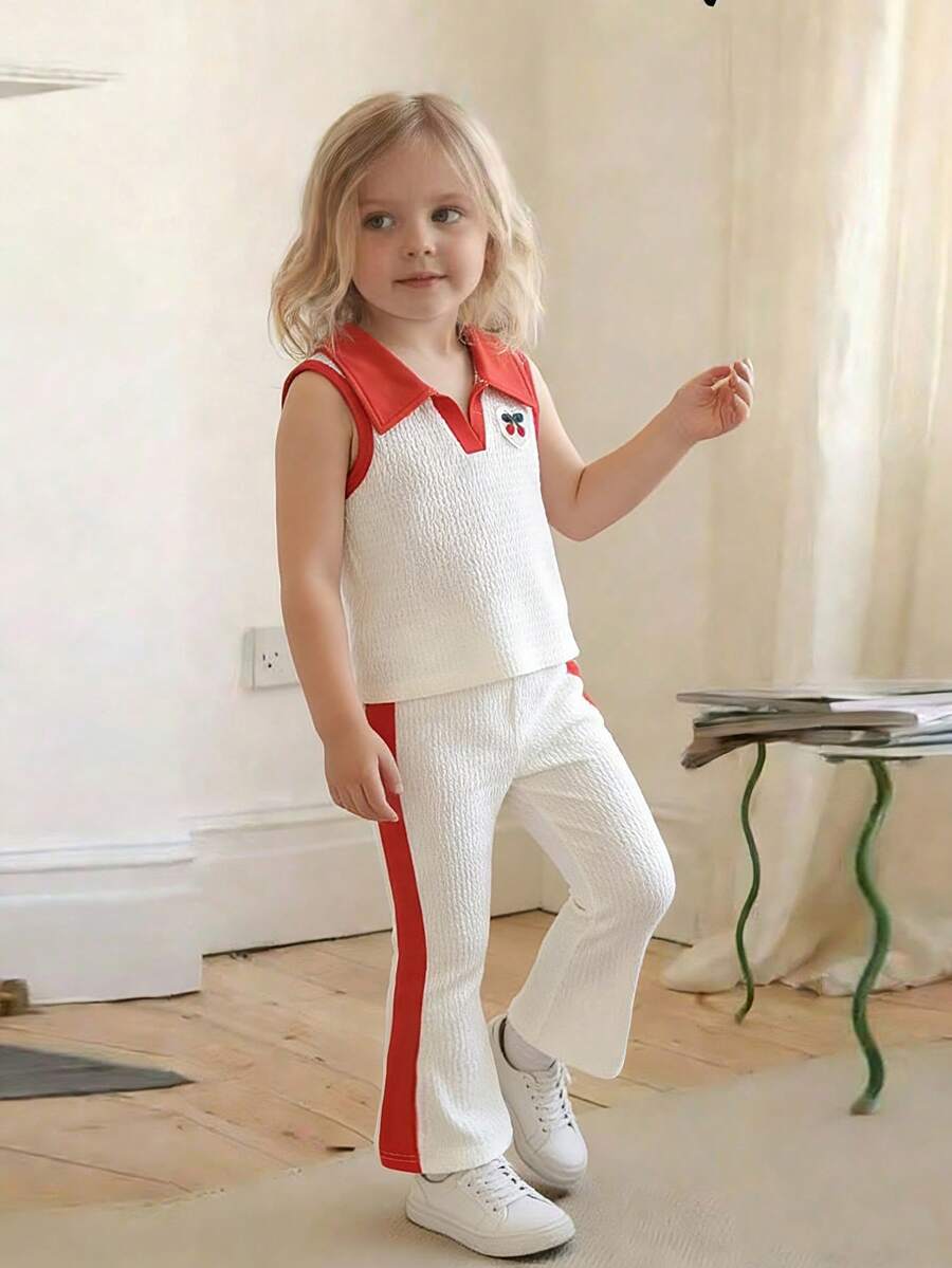 Playful Pals طقم ملابس علوية كنزة بياقة على شكل حرف V بدون أكمام مطبوعة بقلوب وكرز وبنطلون بألوان متباينة على الجوانب للفتيات الصغيرات - لون مشمشي - مشاهدة 1