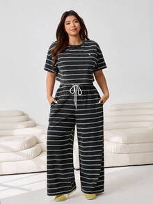 Solflare 春夏新款休闲套装，适合外出、聚会、约会、生日、节日、返校、度假等多种场合。短袖露脐T恤搭配宽松长裤，做旧条纹和斑点黑色，大码可选。 - 黑與白 - 查看 6