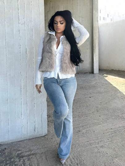 Vassilux Damjacka i enfärgad fluffig väst med öppen front för vintern