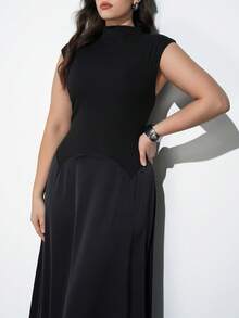 Maija 加大码黑色连衣裙，2026春夏新款，浪漫缎面拼接设计，舒适优雅的收腰廓形，适合女性办公/休闲场合穿着。 - 黑色 - 查看 7