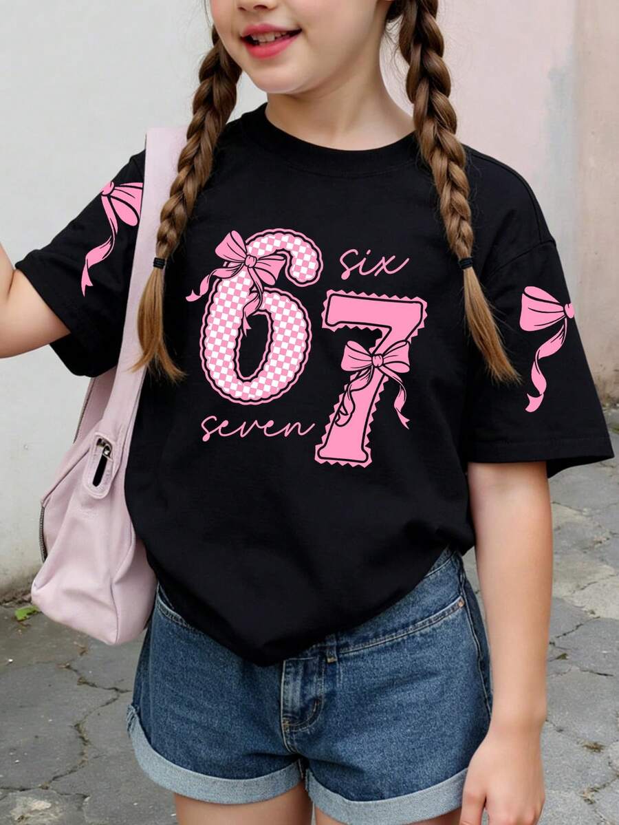 SHEIN T-shirt court décontracté de base pour filles préadolescentes, avec imprimé graphique de numéro 67, nœud en dentelle et slogan. Confortable pour le port quotidien, styles cosy pour l'été et l'automne, convient pour le printemps, l'été et l'automne - Noir - Voir 1