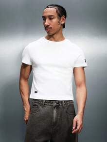 PLAYBOY X SUMWON Camiseta básica de cuello redondo de manga corta, ajuste regular, casual para hombre, ideal para verano, primavera y otoño, color blanco - Blanco - Ver 1