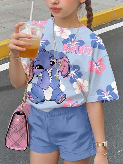 两件套少女休闲卡通印花短袖上衣和短裤套装，适合夏季穿着