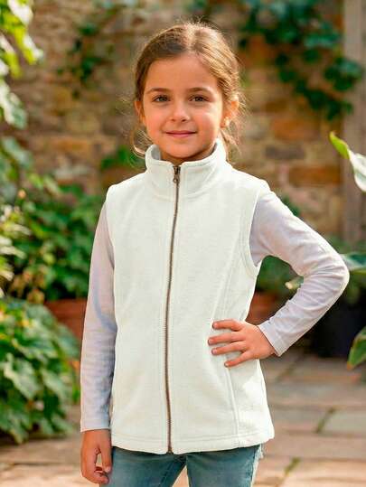 Chaleco afelpado tipo fleece con cierre completo y cuello alto. Abrigador, ligero y cómodo, ideal para niña