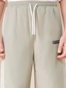 SUMWON Boys Relaxed Fit Side Taping Sweatpants With Elastic Waistband Wide Leg Casual Comfort Nylon Track Pants For Everyday Wear - Light Grey - View 5