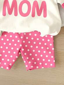 SHEIN Bộ đồ thể thao nữ dễ thương gồm áo thun ngắn tay cổ tròn dáng rộng thoải mái in chữ và quần short bó sát, thích hợp mặc hàng ngày vào mùa xuân/hè, phong cách đường phố, ở nhà hoặc đi nghỉ mát. - Nhiều màu - Xem 7