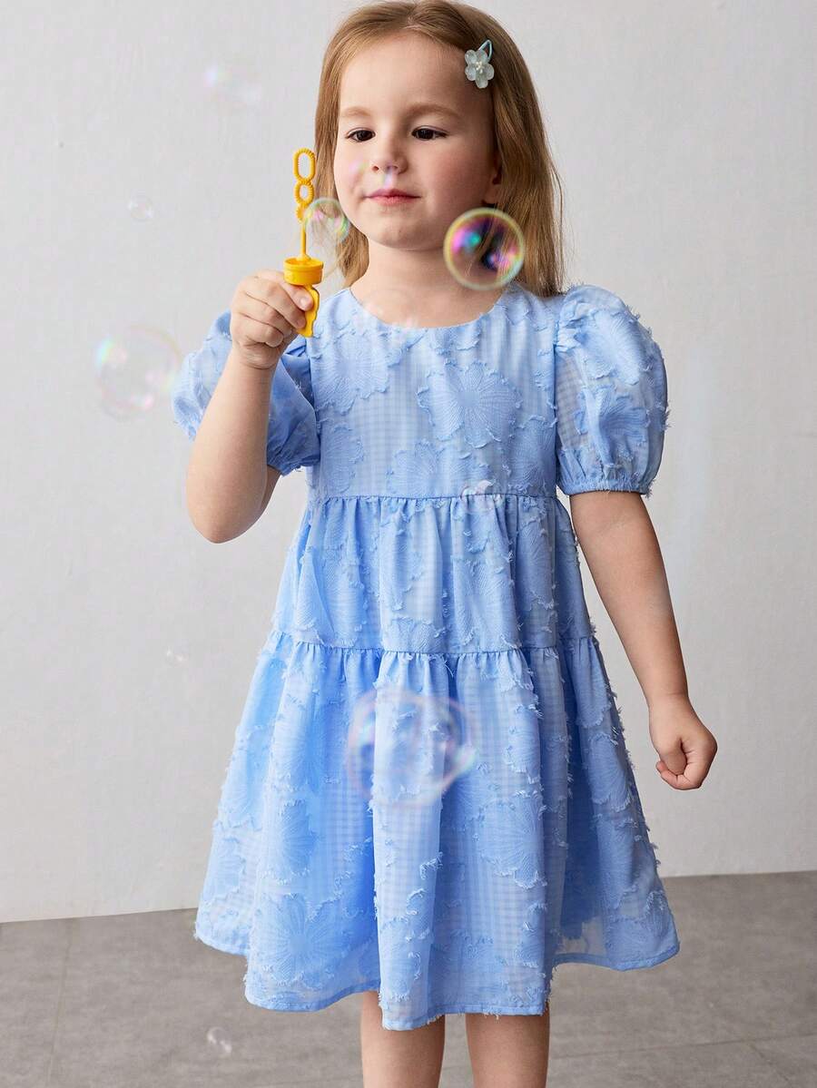 Maija Kids Vestido casual y cómodo con cuello redondo, mangas abultadas y cintura ceñida, con estampado floral y unicolor para niña - Azul - Ver 1