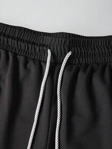 Manfinity Sport Corelite Quần short thể thao nam thường ngày in họa tiết, kiểu dáng 2 trong 1, có dây rút, màu đen. - màu đen - Xem 6