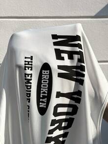 SHEIN EZwear 春夏新款休闲套装，适合外出、日常穿着、派对、音乐节、返校、毕业典礼、度假、购物、下午茶、街头穿搭。套装包含一件圆领短袖修身白色T恤（印有黑白字母图案）和一条黑色弹力针织鱼尾中长裙。大码两件套。 - 彩色 - 查看 7