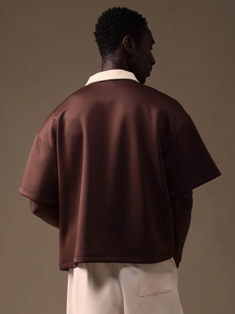 Camisa polo bordada com gola