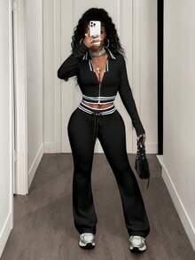 BamGleam Bộ 2 món gồm áo crop top cổ bẻ phối màu tương phản và quần ống loe ôm sát, phong cách thể thao năng động, thường ngày. - màu đen - Xem 6