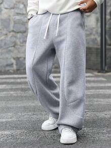 PAVTROS Quần thể thao nam phong cách đường phố trẻ trung, đa năng: Quần ống rộng dáng suông thiết kế xẻ tà, phù hợp cho trang phục đường phố, sinh hoạt thường ngày, đi chơi cuối tuần, lễ hội âm nhạc, tụ họp bạn bè và nhiều dịp khác. Chiếc quần này là một món đồ không thể thiếu trong tủ quần áo của phái mạnh, là món quà tuyệt vời dành cho bạn trai hoặc chồng. - Xám - Xem 5