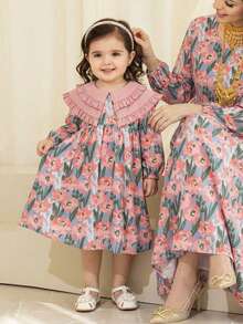 Babygirl Elegant Cute Floral Pattern Peter Pan Collar Long Sleeve Dress This Elegant And Adorable Floral Print Peter Pan Collar Long-Sleeved Dress Is Perfect For Baby Girls. It Features A Small Floral Print In Pastoral Pink, Making It A Charming And Youthful Choice. The Tulip Print Adds A Touch Of Style. Suitable For Various Occasions, Both Indoors And Outdoors. - Multicolor - View 1