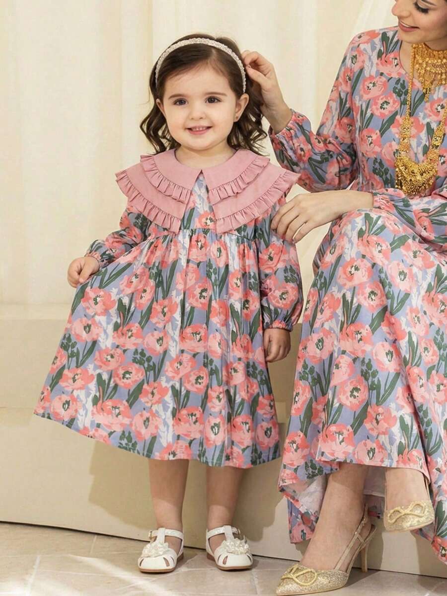 Babygirl Elegant Cute Floral Pattern Peter Pan Collar Long Sleeve Dress This Elegant And Adorable Floral Print Peter Pan Collar Long-Sleeved Dress Is Perfect For Baby Girls. It Features A Small Floral Print In Pastoral Pink, Making It A Charming And Youthful Choice. The Tulip Print Adds A Touch Of Style. Suitable For Various Occasions, Both Indoors And Outdoors. - Multicolor - View 1