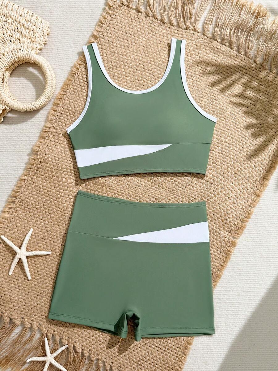 SHEIN Bộ đồ bơi 2 mảnh cho bé gái tuổi teen, màu xanh đậm và trắng phối tương phản: áo tank top và quần short, thoải mái và dễ thương, co giãn tốt.