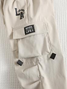 男童休闲时尚街头通勤字母贴布翻盖口袋工装裤，夏季宽松工装裤，Y2K风格 - 卡其色 - 查看 4