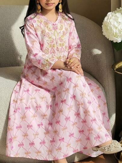 SHEIN عباية بياقة على شكل حرف V وأكمام طويلة مع طبعة فيونكة باللون الوردي الفاتح للفتيات المراهقات