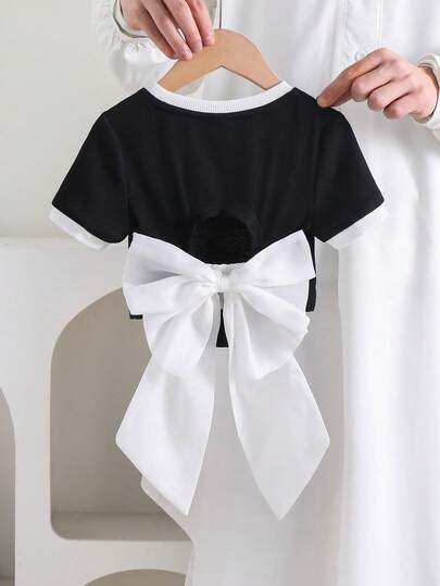 少女纯色针织修身露背短款T恤，饰有欧根纱超大蝴蝶结，时尚法式优雅，返校季必备，Y2K风格，甜美酷炫的少女风