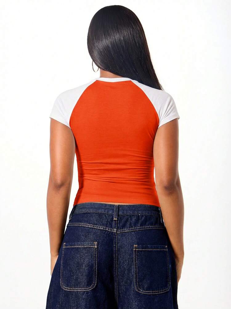SUMWON WOMEN Women's Contrast Raglan Sleeve Tee With Front Graphic Print Short Sleeve Fitted Crop Top Orange White Colorblock Summer Casual Shirt