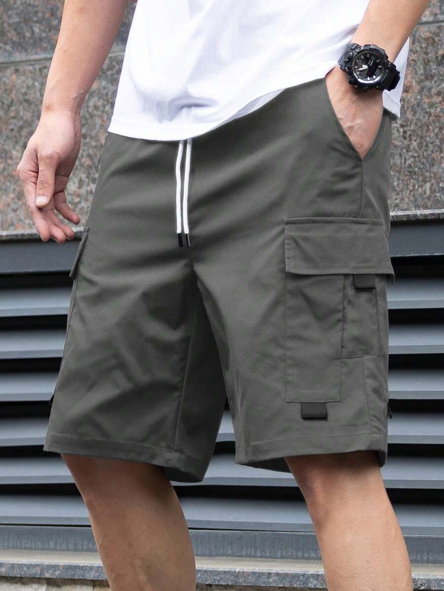Manfinity Homme شورت رجالي بجيب لون أحادي الخصر بسحاب كاجوال فضفاض، شورت كاجوال رجالي، شورت كارجو للرجال - رمادي غامق - مشاهدة 1