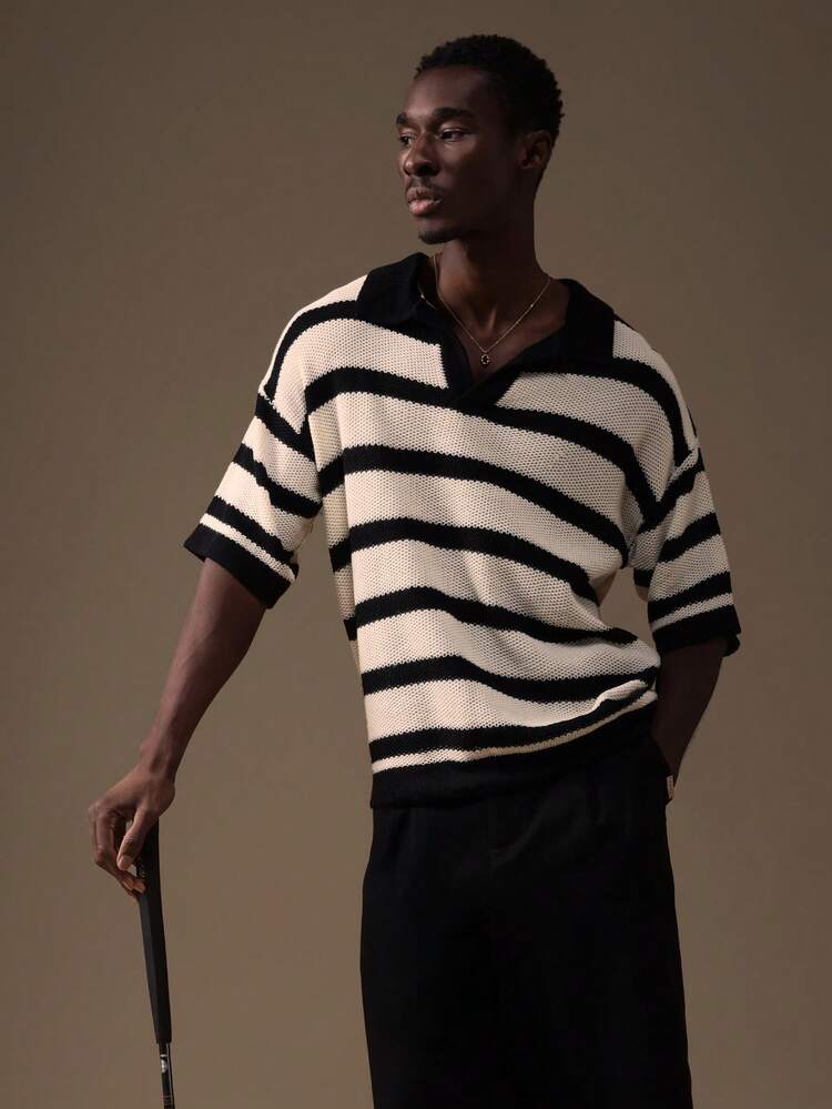 Sweter w paski z dekoltem w serek