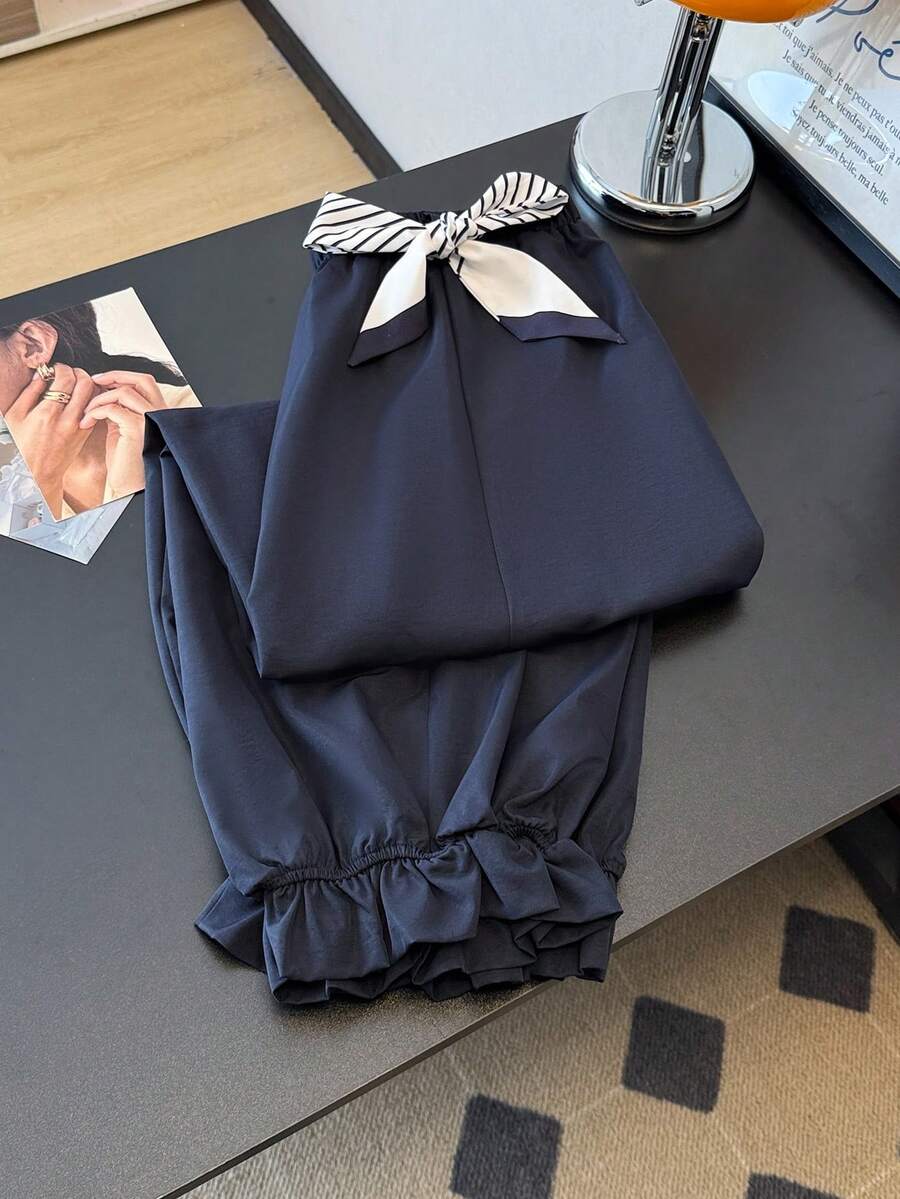 GlowEve CURVE Plus Size Women's Solid Color Cropped Pants, Lantern Pants, Elastic Waist, Loose Fit Casual Pants, Vacation Elegant Baggy Pants Navy Blue Bloomers Bow Pants Office Bow Shorts Bloomers Ruffle Shorts Shorts With Bows Ruffle Shorts - Navy Blue - View 1