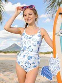 SHEIN Conjunto de traje de baño de una pieza con tirantes finos y falda pareo con estampado de conchas marinas para niña preadolescente en vacaciones de verano - Azul - Ver 6