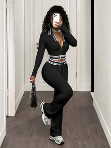 BamGleam Bộ 2 món gồm áo crop top cổ bẻ phối màu tương phản và quần ống loe ôm sát, phong cách thể thao năng động, thường ngày. - màu đen - Xem 3