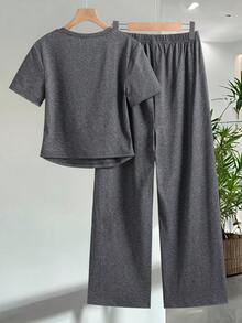 Bộ đồ liền thân, tay ngắn, kiểu dáng thường ngày, in offset, thích hợp cho mùa xuân và mùa hè, bộ đồ đi làm mùa hè cho nữ tuổi teen, quần ống đứng thể thao và thoải mái, bộ hai mảnh tay ngắn nhẹ nhàng và dễ chịu. - Màu xám đen - Xem 2